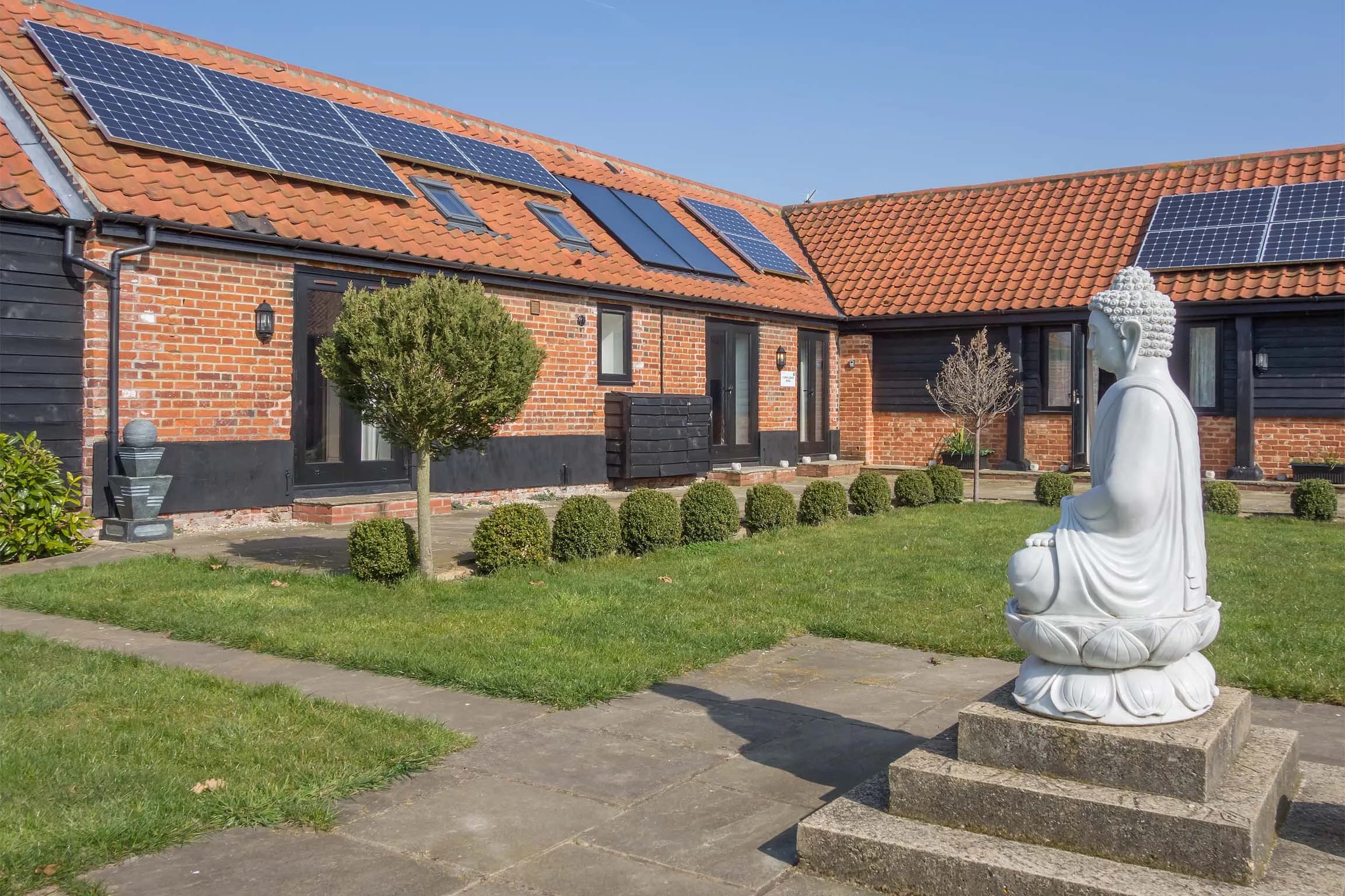 Church Farm Barns exterior at dusk